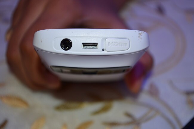 The top of the device features a 3.5 mm headphones jack, HDMI out and a micro USB port for both charging and data transfers.