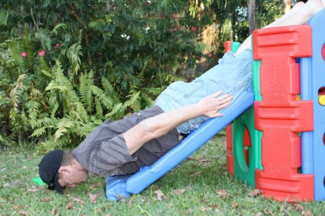 Knocked out and planked on the kids' slide.