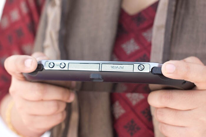 Sony has done away with the UMD Drive and a new PS Vita card-slot makes an appearance on the device.
