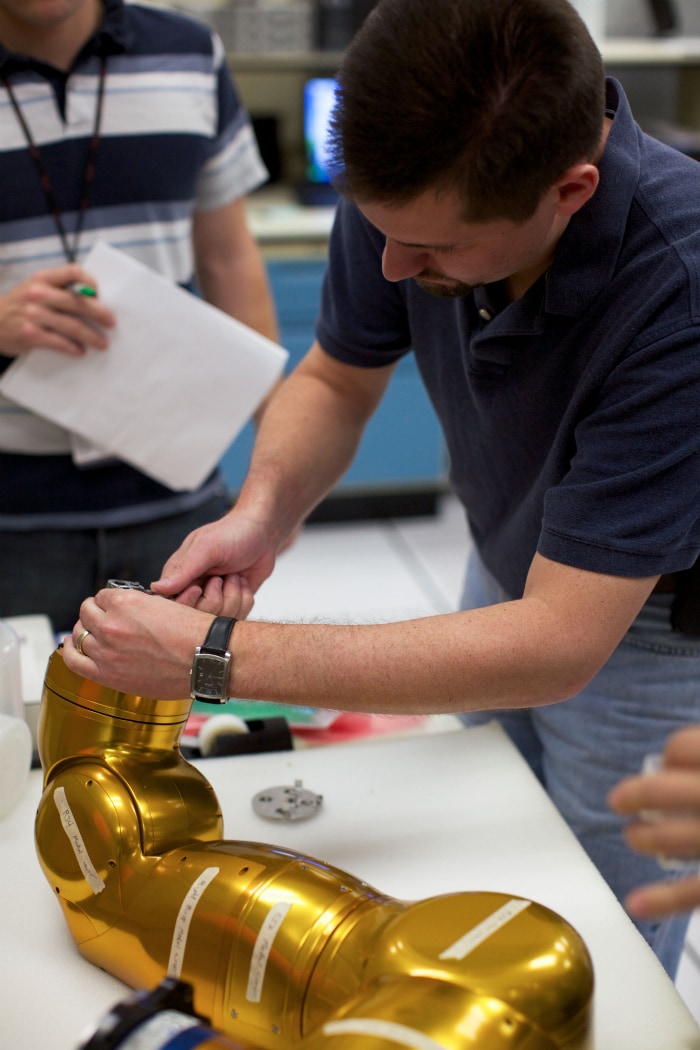 Robonaut 2's arms are disassembled to prepare the robot for electronics upgrades. R2 was designed as a prototype; some changes were necessary to prepare it for life on the International Space Station. (Photo: NASA)