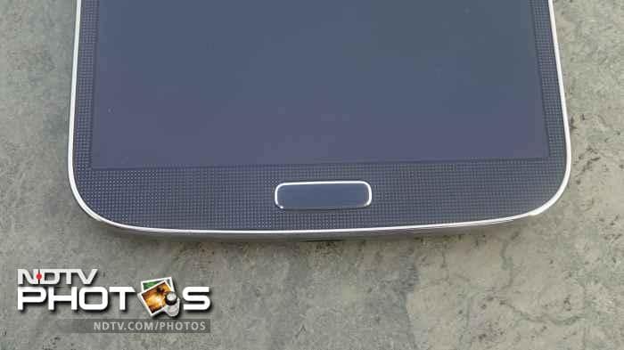 The phone has one hardware button and two capacitive buttons.