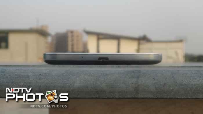 The micro-USB port is located at the bottom of the phone.