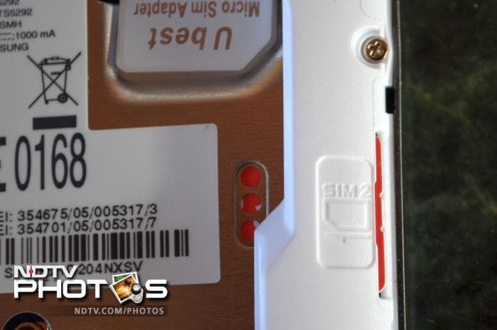 The slot for the secondary SIM card is hidden inside the back cover.