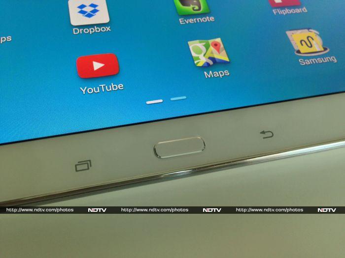 Samsung's trademark of having a physical home button with capacitive touch buttons on either side continues.