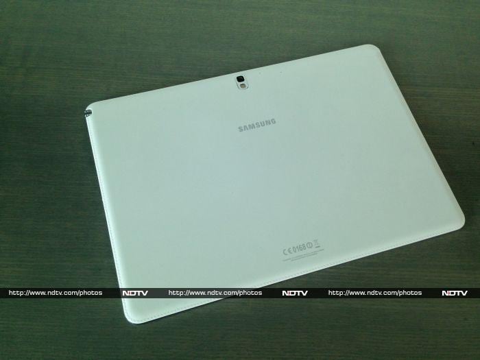 The rear panel is blank other than the camera and Samsung logo. You can see the signature faux stitched leather texture.