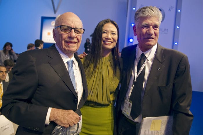 Rupert Murdoch (L), chairman and CEO of News Corporation, was at e-G8 with wife Wendi (C) and conference organizer Maurice Levy, CEO of Publicis. (Photo: AFP)