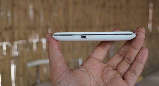The Micro-USB port for charging and data transfers sits on the left of the smartphone.