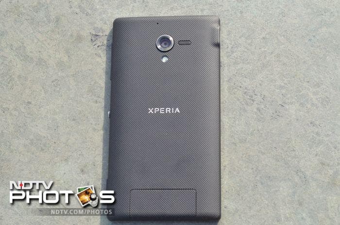 The back of the phone has a textured plastic cover for a better grip.