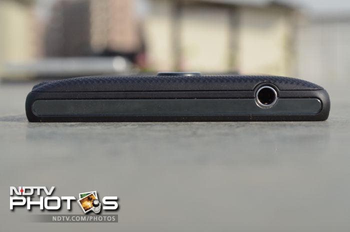 The top features a 3.5mm headphone jack.