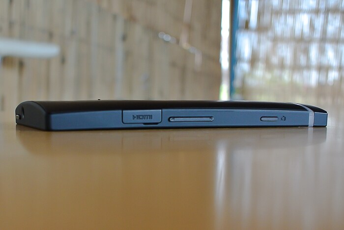 HDMI port, volume key and shutter button for the camera are placed on the right side.