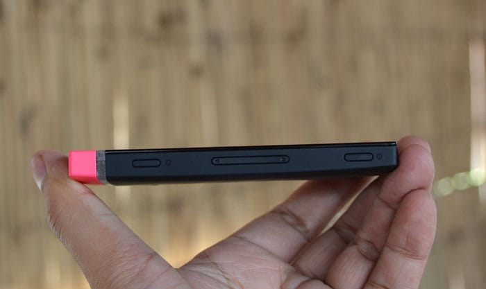 The right panel of the device features the power button, volume rocker and a dedicated camera key.