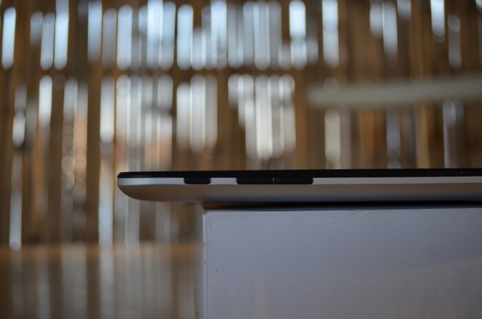 The top of the tablet sports a Power/Sleep button and a volume rocker, all in plastic.