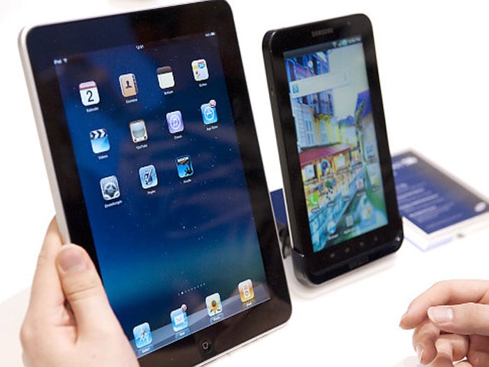 The Apple iPad and the Samsung Galaxy Tab compared to each other.