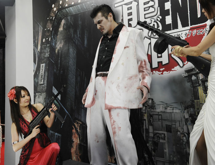 Models dressed as yakuza videogame characters for the promotion of new software at the Tokyo Game Show in Chiba city, suburban 
(Photo: AFP)