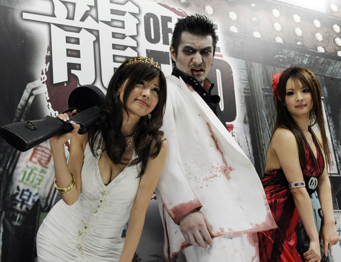 Models dressed as yakuza videogame characters for the promotion of new software at the Tokyo Game Show in Chiba city (Photo: AFP)