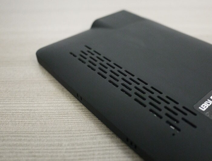 The speaker takes most of the space at the back.