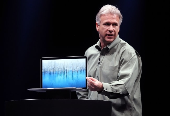 Apple Senior Vice President of Worldwide product marketing Phil Schiller announces the new MacBook Pro during the keynote address.