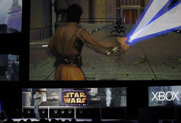 A game player demonstrates "Kinect Star Wars" at the Microsoft Xbox global media briefing at E3 2011. (Photo: AFP)