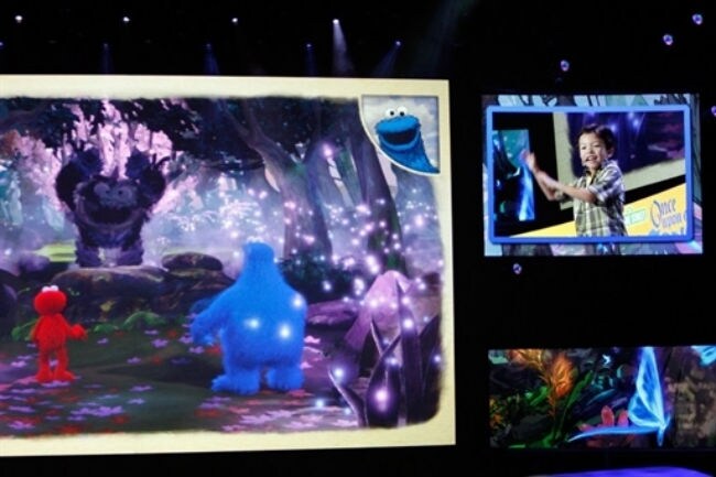 A child demonstrates the interactive Sesame Street Once Upon a Monster game, one in many titles aimed at kids at the Electronic Entertainment Expo (E3). (Photo: AFP)