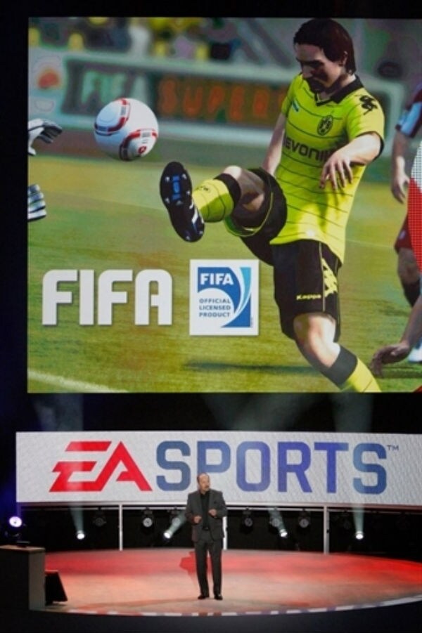 EA Sports president Peter Moore demonstrates a FIFA soccer game at the Electronic Entertainment Expo (E3). (Photo: AFP)