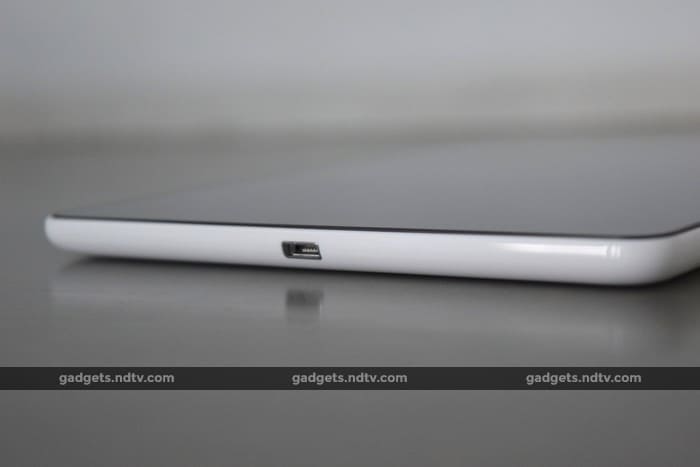 There is a Micro-USB port on the bottom.