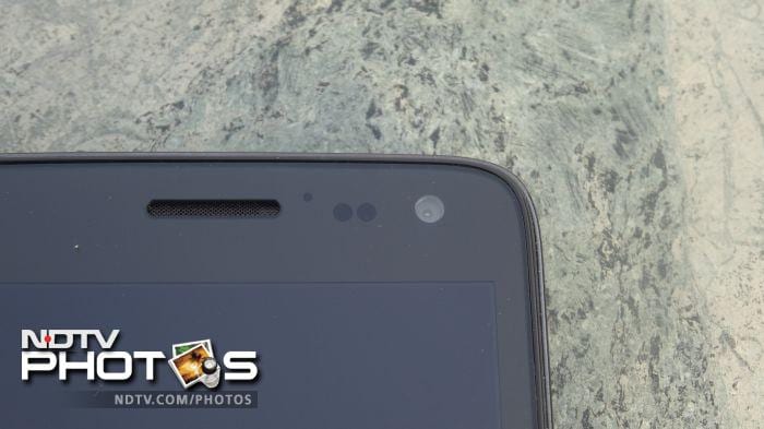 The sensors, front camera and earpiece grill sit above the screen.