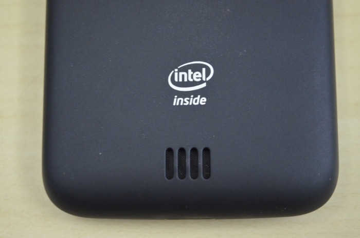 At the back of the phone is the speaker grill along with the Intel branding.