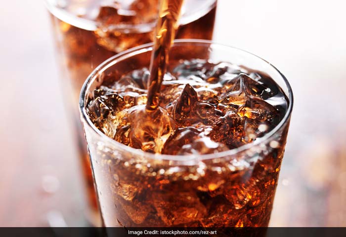 Soft drinks are an easy route through which calories sneak into your body. Avoid these sugary drinks and have more water instead.