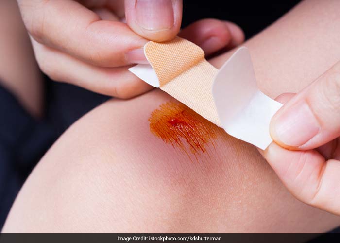 Carefully clean the wound if it is not bleeding and apply a sterile dressing.