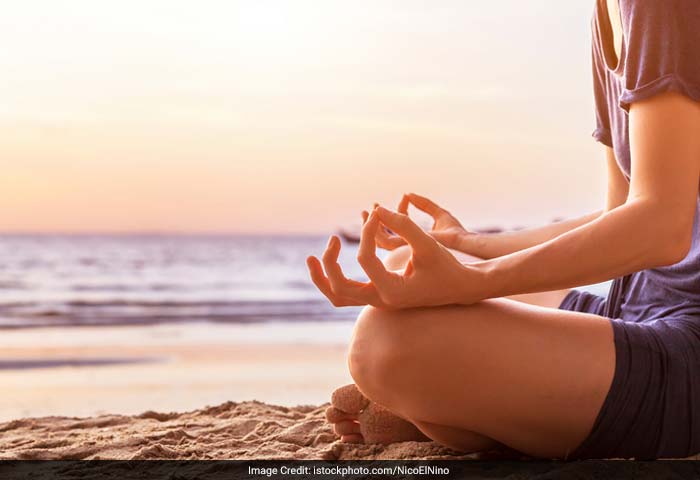 Practice stress reducing methods such as meditation and yoga. These healing treatments can have positive effects on physical health and your hair condition too.