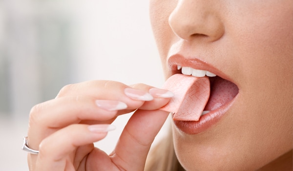 Chew a sugar free gum as it moves the jaw constantly and helps you get rid of a double chin.