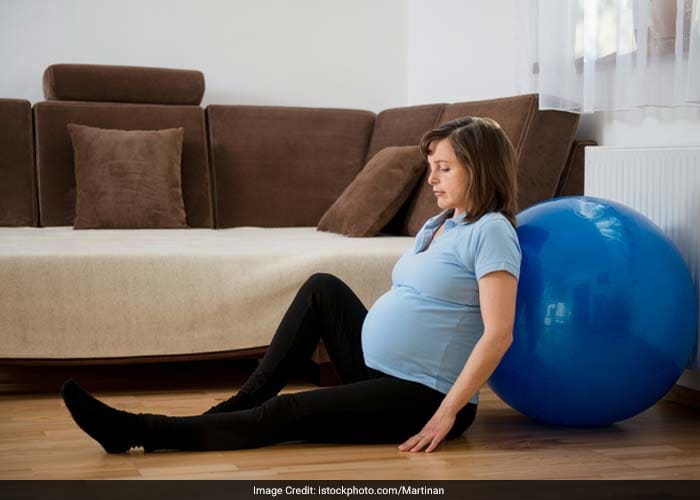 You should reduce the amount of exercise as the babys due date gets closer. This is due to your own physical limitations as well as the increased risk for pre-term labour among highly active women.