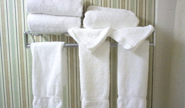 Towels or washcloths could be infected with viruses or bacteria. So, you should use your own towels. Used towels should be washed properly and should be changed frequently.