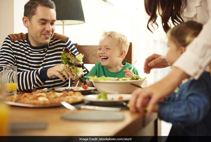 Make meal times enjoyable and talk about what the child is doing.