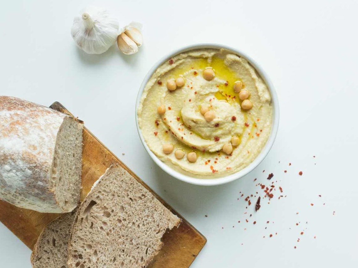 Hummus is packed with chickpeas, which are a great source of plant-based protein. Adding hummus to your diet can help meet protein needs, especially for vegetarians and vegans. Protein supports muscle repair, growth, and helps keep you feeling full.