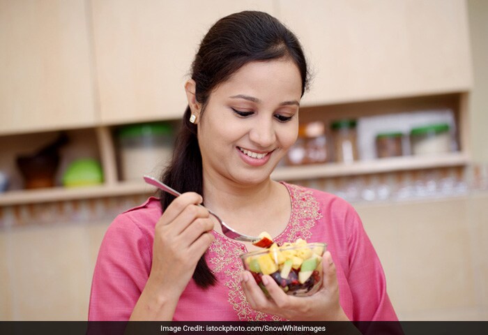 Choose snacks that are nutritious and filling. Have a piece of fresh fruit, cut raw vegetables, or a small bowl of low-fat yoghurt.