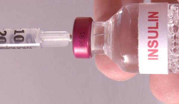 Mix the insulin in the ampoule gently by rotating the bottle between your palms or by inverting it slowly from end to end.