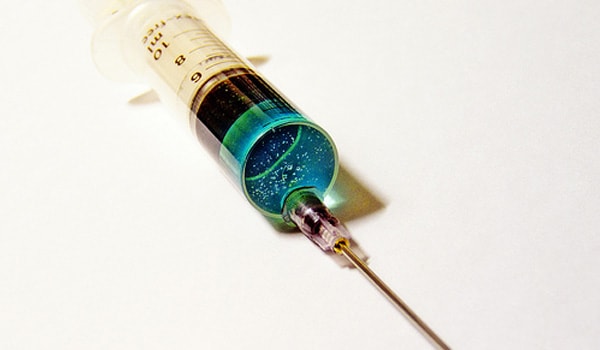 Clean the skin at the site of injection with an alcohol swab. Pinch up an area of the skin and insert the needle at a right angle fully into the skin.
