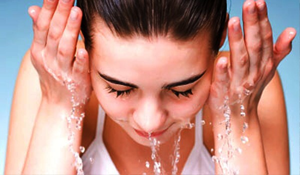 Use a good soap-free cleanser. You could also use a gentle scrub once a day to remove all the dust.