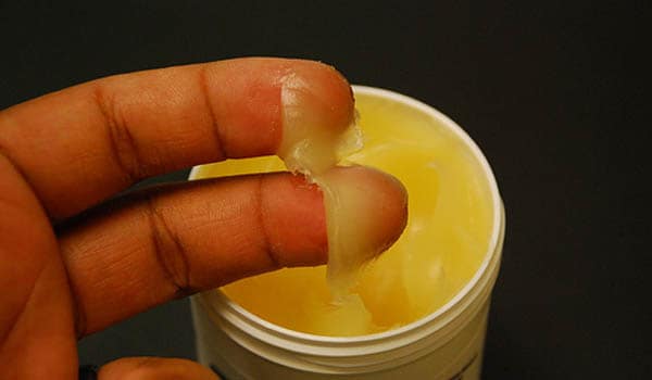 To keep your nails healthy, it is necessary to keep them hydrated. Rub a small amount of petroleum jelly into your cuticle and the skin surrounding the nails every evening before you go to bed or whenever your nails feel dry.