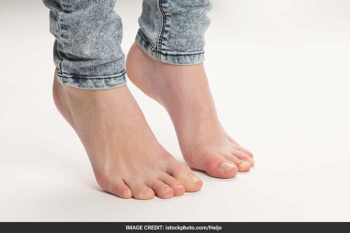 Ankle Stretch: Sit comfortably with both feet touching the floor. Extend your right leg so that toes are pointing down and inhale. Exhale as you flex your foot up. Repeat 5 times.