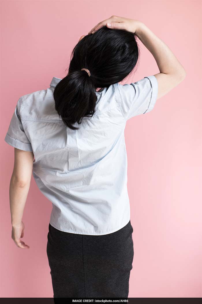 Stand in front of your chair with your feet apart and shoulders level. Get your shoulders in a round position, lifting alternate shoulders to your ear, push shoulders back and forwards.