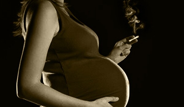 Smoking reduces folate levels, a B vitamin that is important for preventing birth defects. Women who smoke may pass genetic mutations that increase cancer risks to their unborn babies.