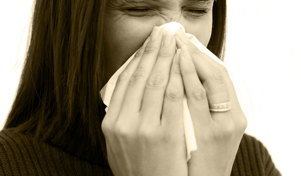 Cover your nose and mouth with a tissue when you cough or sneeze. Throw the tissue in the trash after you use it.