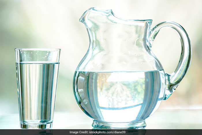 Drink at least 8-10 glasses of water a day. It helps hydrate the skin and also removes impurities from the body.
