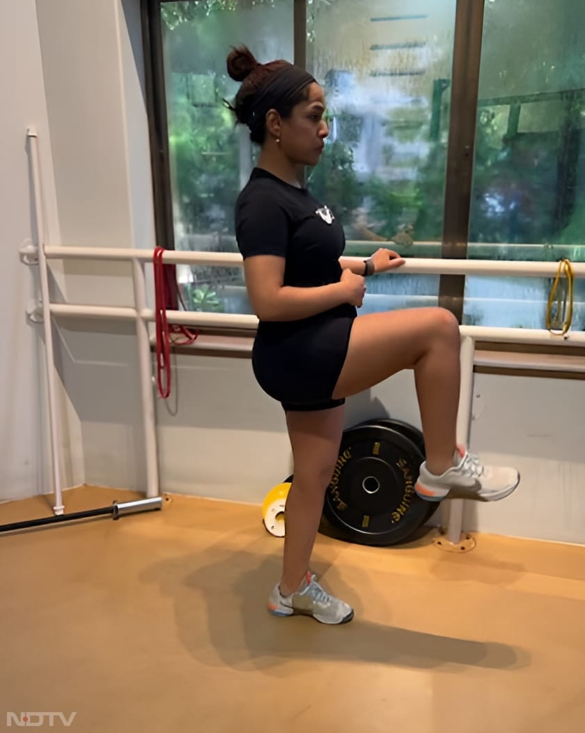 Mom-to-be Masaba Gupta performed a variation of bent leg raises to strengthen her glutes and thigh muscles. This exercise is also an excellent way to enhance leg mobility. (Instagram/@masabagupta)