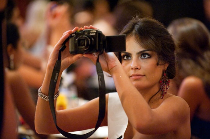 Jimena Navarrete, Miss Mexico 2010, takes a photo inside Todd English Pub at Aria Resort and Casino in Citycenter, Las Vegas, Nevada on Tuesday, August 17, 2010. (Photo: ho/Miss Universe Organisation LP, LLLP)