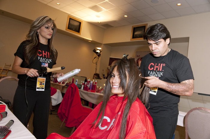 Jimena Navarrete, Miss Mexico 2010, has her hair done by Chi Hair Stylists Lorena Garcia and Victor Bravo, as she starts the registration and fitting process in preparation for the Miss Universe 2010 Competition at Mandalay Bay Hotel and Casino in Las Vegas, Nevada on Saturday, August 7, 2010. (Photo: ho/Miss Universe Organisation L.P., LLLP)