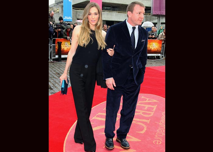 The film's director, Guy Ritchie with his girlfriend Jacqui Ainsley, at the premiere.