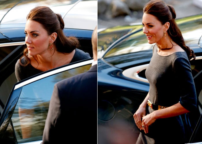 Fashionista Kate was quick to change into a sleek charcoal grey Amanda Wakeley dress for her second outing in the evening. With an elegant hairstyle, dazzling golden belt, dangling gold ear rings and a stylish black clutch, Kate looked a class apart as she walked in to attend a reception at the Imperial War Museum in London.